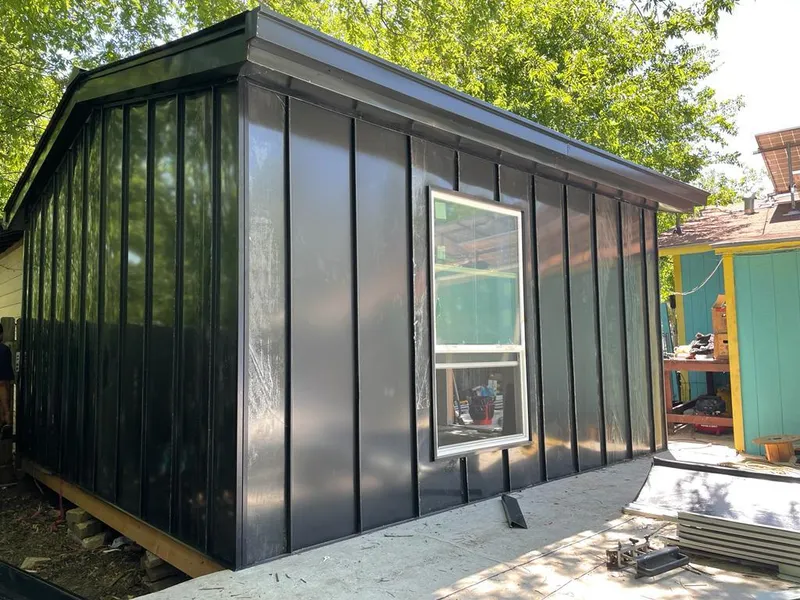 Black standing seam metal wall panels for Roof Inspection in Jasmine Estates