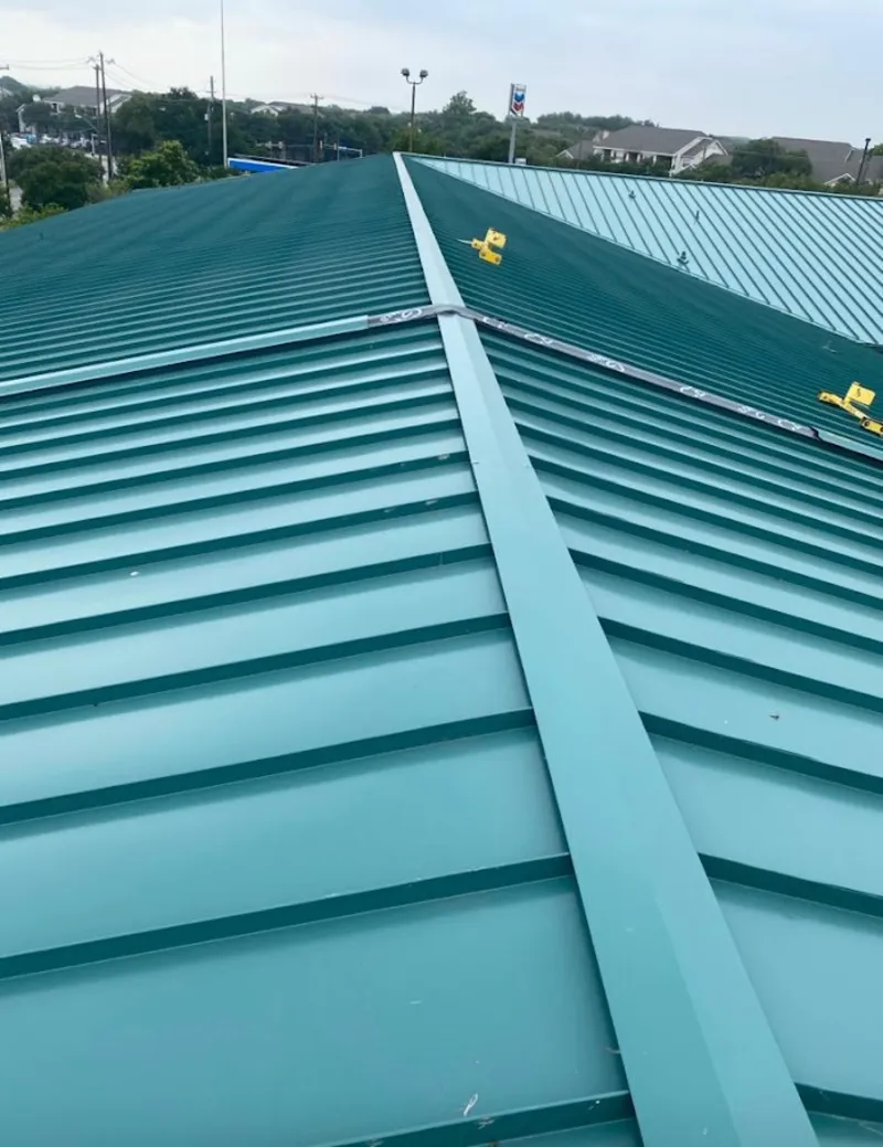 Green commercial metal roof ridge and valley for Metal Roof Repair in Jasmine Estates